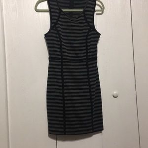 Black and grey knee length office dress.